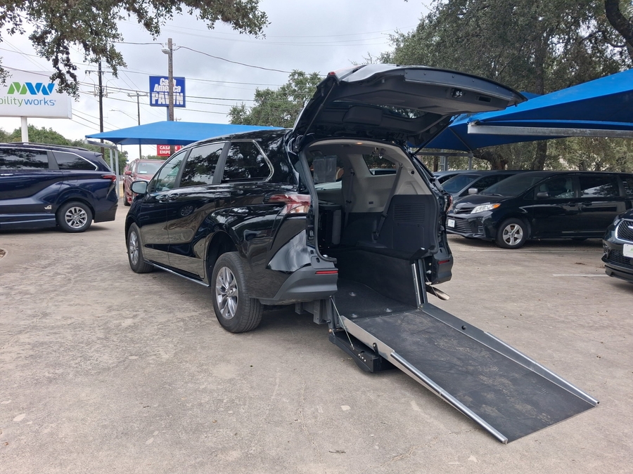 Black Toyota Sienna with Driverge Rear Entry Manual Fold Out conversion