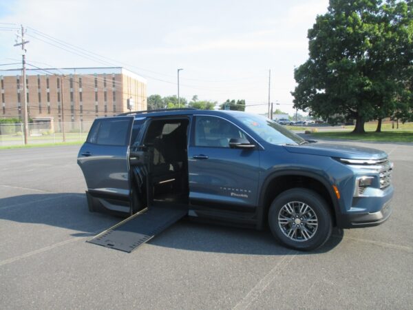 Blue Chevrolet Traverse with BraunAbility Side Entry Automatic In Floor conversion
