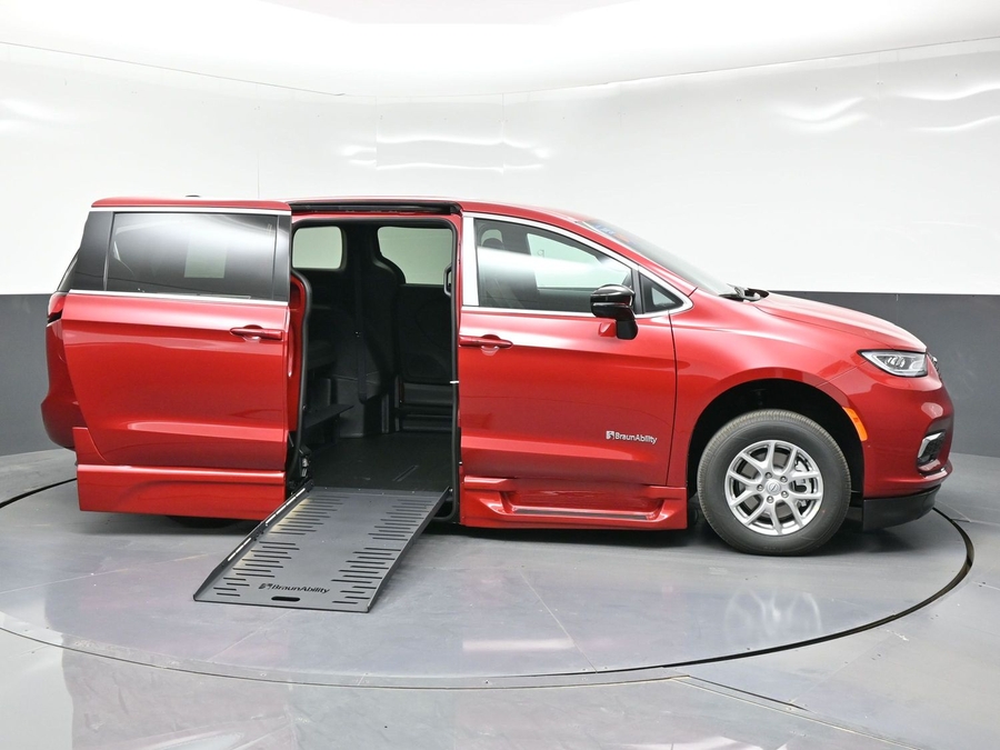Red Chrysler Pacifica with BraunAbility Side Entry Automatic Fold Out conversion