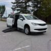 White Chrysler Voyager with BraunAbility Side Entry Manual Fold Out conversion