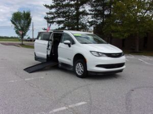 White Chrysler Voyager with BraunAbility Side Entry Manual Fold Out conversion