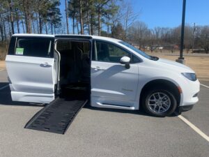 White Chrysler Pacifica with BraunAbility Side Entry Automatic Fold Out conversion