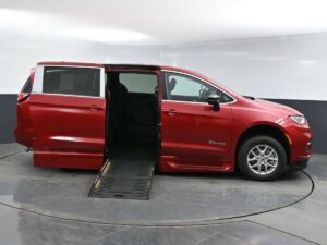 Red Chrysler Pacifica with BraunAbility Side Entry Automatic Fold Out conversion