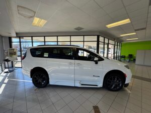 White Chrysler Pacifica with BraunAbility Side Entry Automatic In Floor conversion