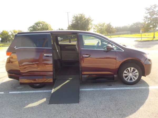 Red Honda Odyssey with Vantage Mobility Side Entry Automatic In Floor conversion