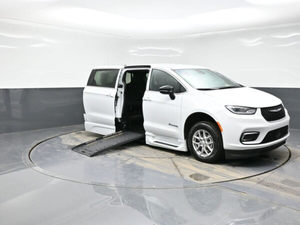 White Chrysler Pacifica with BraunAbility Side Entry Automatic Fold Out conversion