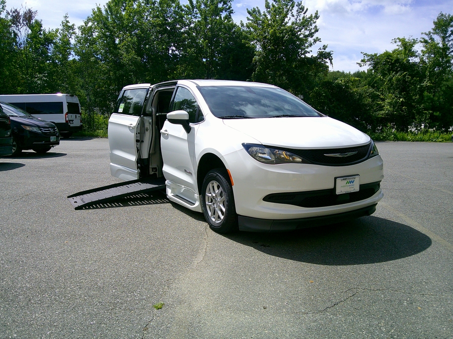 White Chrysler Voyager with BraunAbility Side Entry Automatic Fold Out conversion