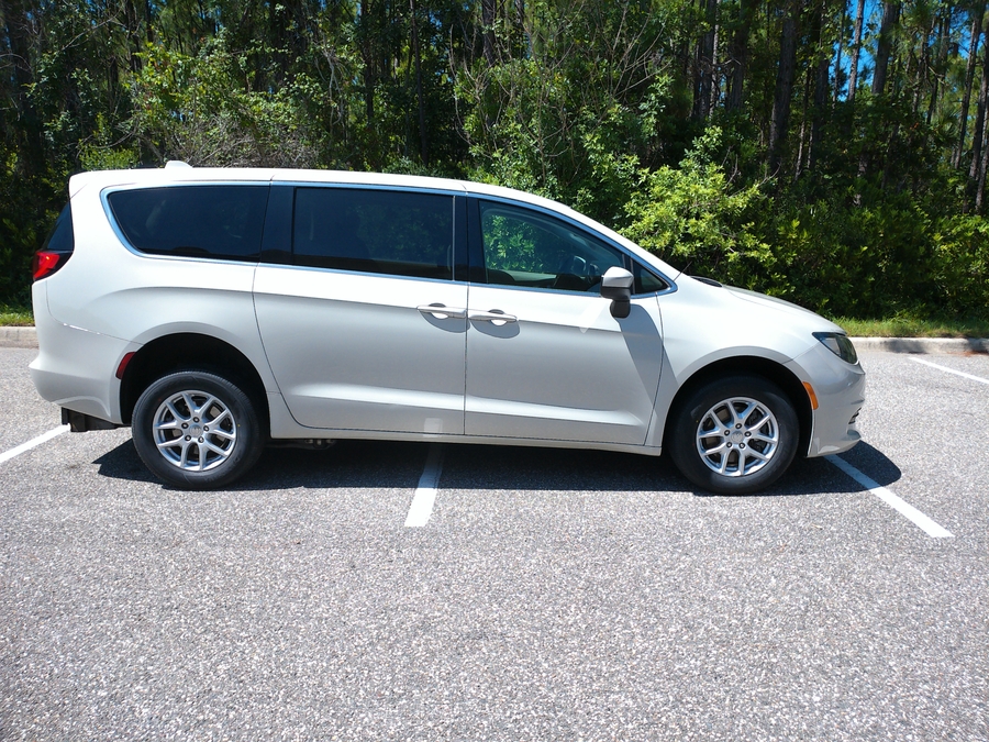 White Chrysler Pacifica with BraunAbility Rear Entry Manual Fold Out conversion