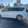 White Chrysler Pacifica with Driverge Side Entry Automatic Fold Out conversion