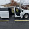 White Chrysler Pacifica with Driverge Side Entry Automatic Fold Out conversion