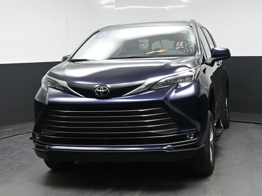 Blue Toyota Sienna with BraunAbility Side Entry Automatic Fold Out conversion