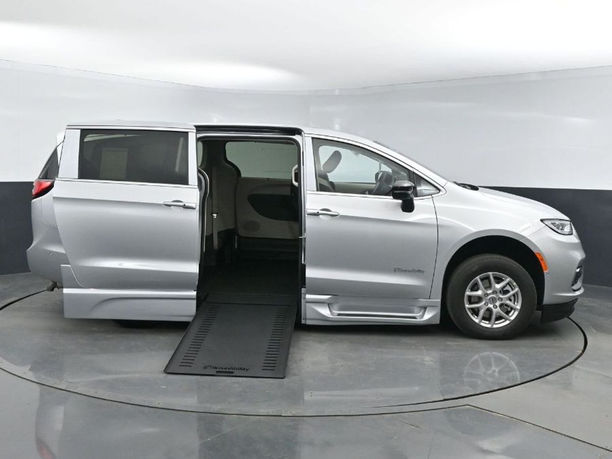 Silver Chrysler Pacifica with BraunAbility Side Entry Automatic In Floor conversion