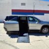 Grey Chevrolet Traverse with BraunAbility Side Entry Automatic In Floor conversion