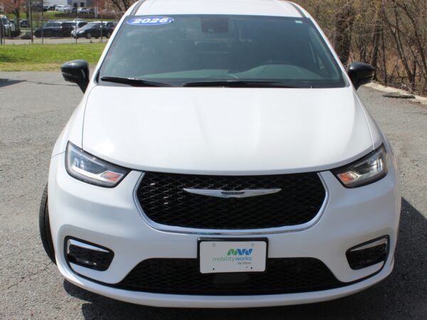 White Chrysler Pacifica with Adaptive Vans Rear Entry Manual Fold Out conversion