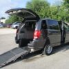 Grey Dodge Grand Caravan with Driverge Rear Entry Manual Fold Out conversion