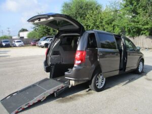 Grey Dodge Grand Caravan with Driverge Rear Entry Manual Fold Out conversion