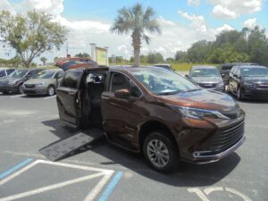 Orange Toyota Sienna with BraunAbility Side Entry Automatic Fold Out conversion