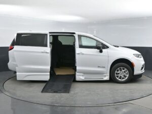 White Chrysler Pacifica with BraunAbility Side Entry Automatic Fold Out conversion