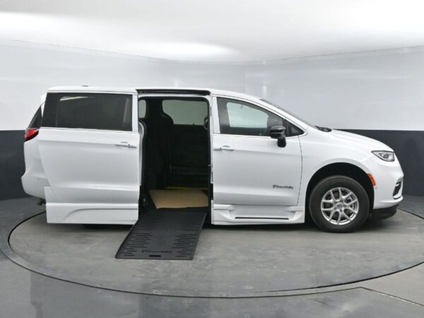 White Chrysler Pacifica with BraunAbility Side Entry Automatic Fold Out conversion