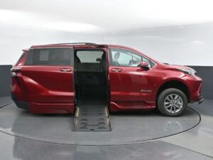 Red Toyota Sienna with BraunAbility Side Entry Automatic Fold Out conversion