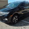 Black Honda Odyssey with BraunAbility Side Entry Automatic In Floor conversion