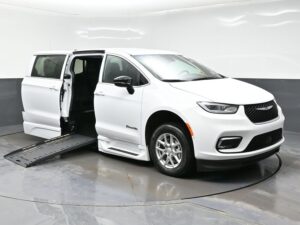 White Chrysler Pacifica with BraunAbility Side Entry Automatic Fold Out conversion