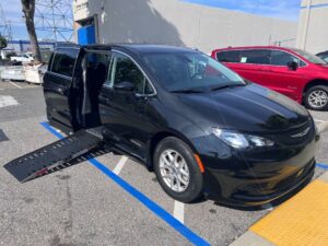 Black Chrysler Voyager with Driverge Side Entry Automatic Fold Out conversion