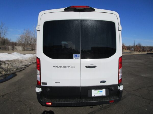 White Ford Transit with Driverge Side Entry Automatic Fold Out conversion