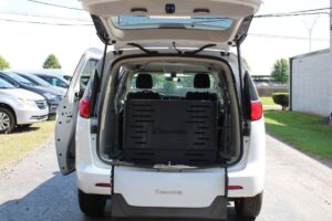 White Chrysler Voyager with BraunAbility Rear Entry Manual Fold Out conversion