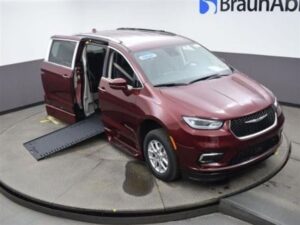 Red Chrysler Pacifica with BraunAbility Side Entry Automatic In Floor conversion