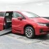 Red Honda Odyssey with BraunAbility Side Entry Automatic In Floor conversion