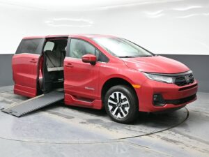 Red Honda Odyssey with BraunAbility Side Entry Automatic In Floor conversion