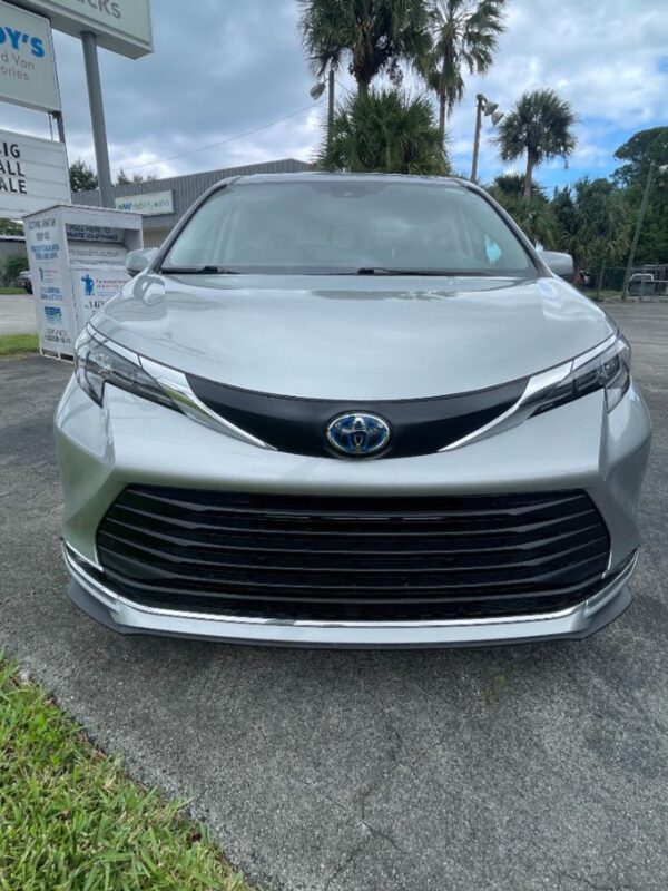 Silver Toyota Sienna with Driverge Rear Entry Manual Fold Out conversion