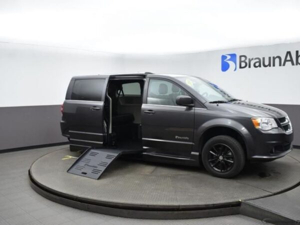 Grey Dodge Grand Caravan with BraunAbility Side Entry Automatic Fold Out conversion