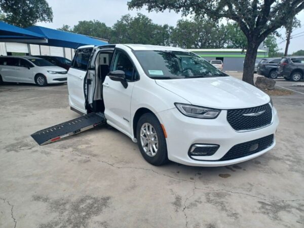White Chrysler Pacifica with Driverge Side Entry Automatic Fold Out conversion