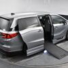 Silver Honda Odyssey with BraunAbility Side Entry Automatic In Floor conversion