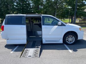 White Dodge Grand Caravan with Other Side Entry Automatic Fold Out conversion