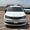 White Chrysler Voyager with Driverge Side Entry Automatic Fold Out conversion