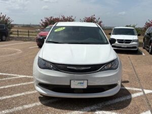 White Chrysler Voyager with Driverge Side Entry Automatic Fold Out conversion