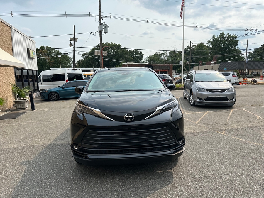 Black Toyota Sienna with BraunAbility Side Entry Automatic In Floor conversion