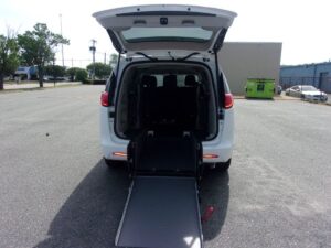 White Chrysler Voyager with Driverge Rear Entry Manual Fold Out conversion