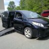 Black Toyota Sienna with BraunAbility Side Entry Manual Fold Out conversion
