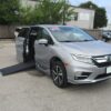 Silver Honda Odyssey with BraunAbility Side Entry Automatic In Floor conversion