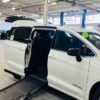 White Chrysler Pacifica with Driverge Side Entry Automatic Fold Out conversion