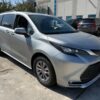 Silver Toyota Sienna with Driverge Rear Entry Manual Fold Out conversion