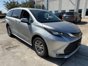 Silver Toyota Sienna with Driverge Rear Entry Manual Fold Out conversion