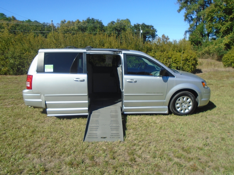 Silver Chrysler Town and Country with BraunAbility Side Entry Automatic Fold Out conversion