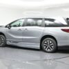Silver Honda Odyssey with BraunAbility Side Entry Automatic In Floor conversion