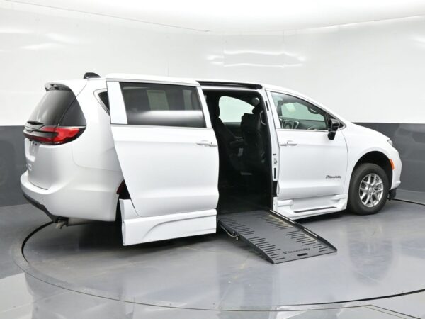 White Chrysler Pacifica with BraunAbility Side Entry Automatic Fold Out conversion