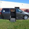 Grey Dodge Grand Caravan with BraunAbility Side Entry Automatic Fold Out conversion